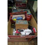 Toys: a Made In Japan battery powered Mystery Action Police Car, boxed; together with another