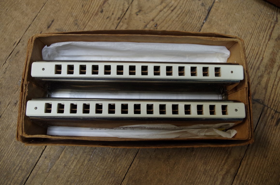 A Hohner 'Octave Base' harmonica, in card box.