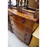 An early 19th century mahogany bow front chest of drawers, 91cm wide, (in two parts).