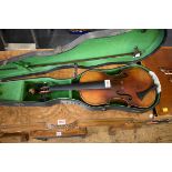 An antique Continental violin, labelled 'Antonius Stradivarius', with 14in two piece back, with
