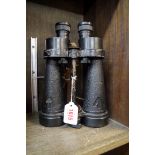 A pair of Barr & Stroud 7x binoculars, with broad arrow stamp.