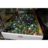 A large collection of glass marbles.