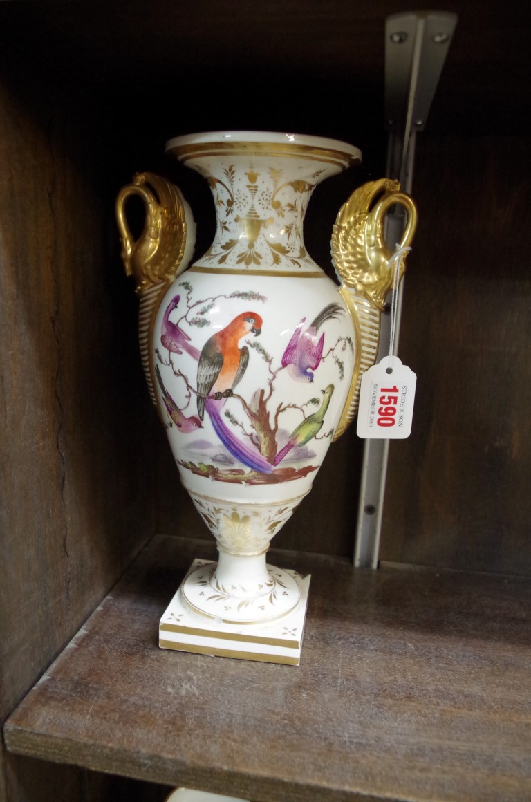A 19th century Bloor Derby twin handled vase, finely painted to both sides with exotic birds, and