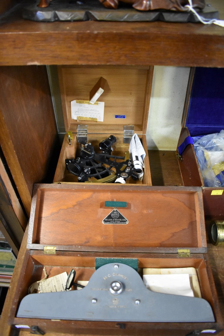 A sextant, by 'F Smith & Son, Southampton', boxed; together with a Watts clinometer, boxed.