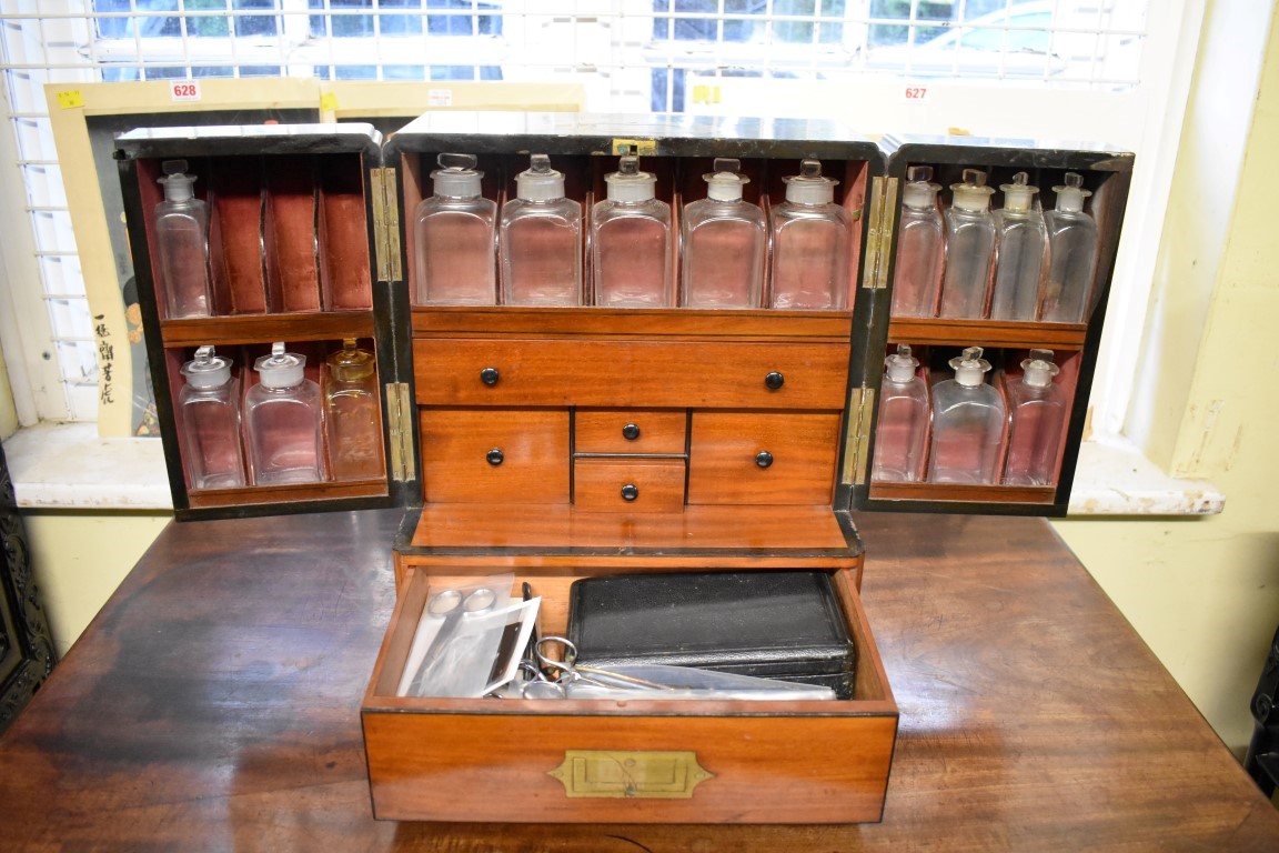 A good Victorian mahogany apothecary cabinet, with gilt brass countersunk handles, with key.