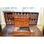 A good Victorian mahogany apothecary cabinet, with gilt brass countersunk handles, with key.