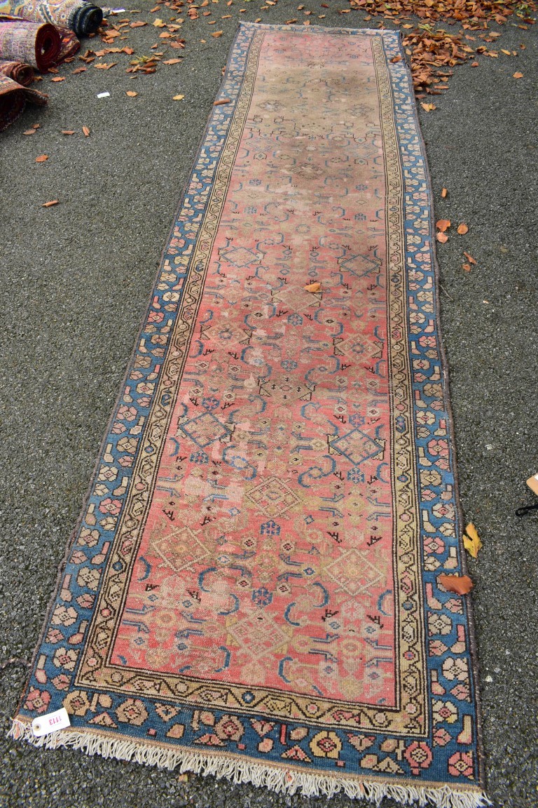 An Eastern runner, having allover geometric design, 350 x 88cm.