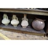 Four old pottery vases, possibly African, 28.5cm high.