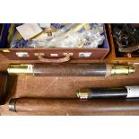 An antique brass and leather single drawer telescope, inscribed 'Dollond, London, Day Or Night',