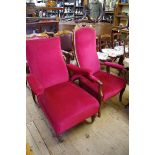 A 19th century walnut and upholstered open arm occasional chair; together with another similarly