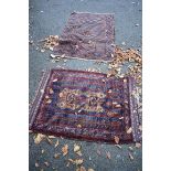 Two old Persian rugs, having geometric design, largest 155 x 96cm.