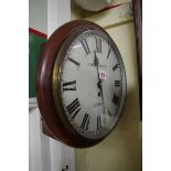 A Victorian mahogany circular wall clock, with single fusee, the 12in painted dial inscribed 'J