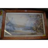 A Roscoe, an alpine lake, signed and dated 1879, watercolour, 32 x 56cm, in a maple frame.