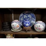 A pair of Chinese famille rose jars, 16.5cm high; together with further Oriental items.