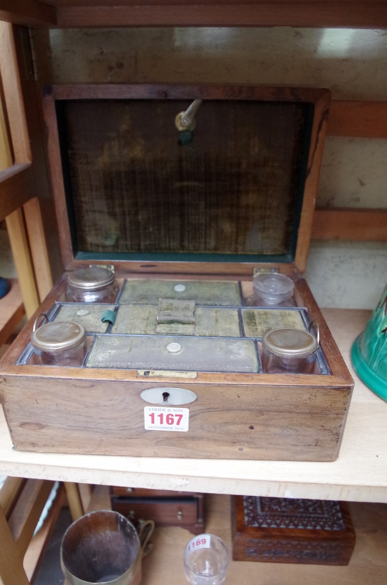 A 19th century rosewood toilet box, 25cm wide.