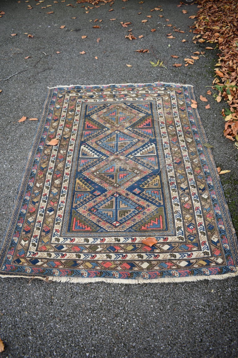 A Bokhara rug, having geometric design, 150 x 113cm.