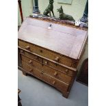 An 18th century oak bureau, 91.5cm wide.