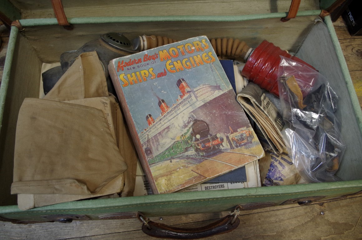 A mixed collection of World War II items and ephemera, in vintage canvas suitcase. - Image 2 of 2