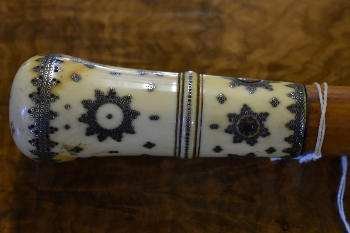 A Queen Anne ivory and pique handled malacca cane, decorated with stylized flower heads. - Image 2 of 5