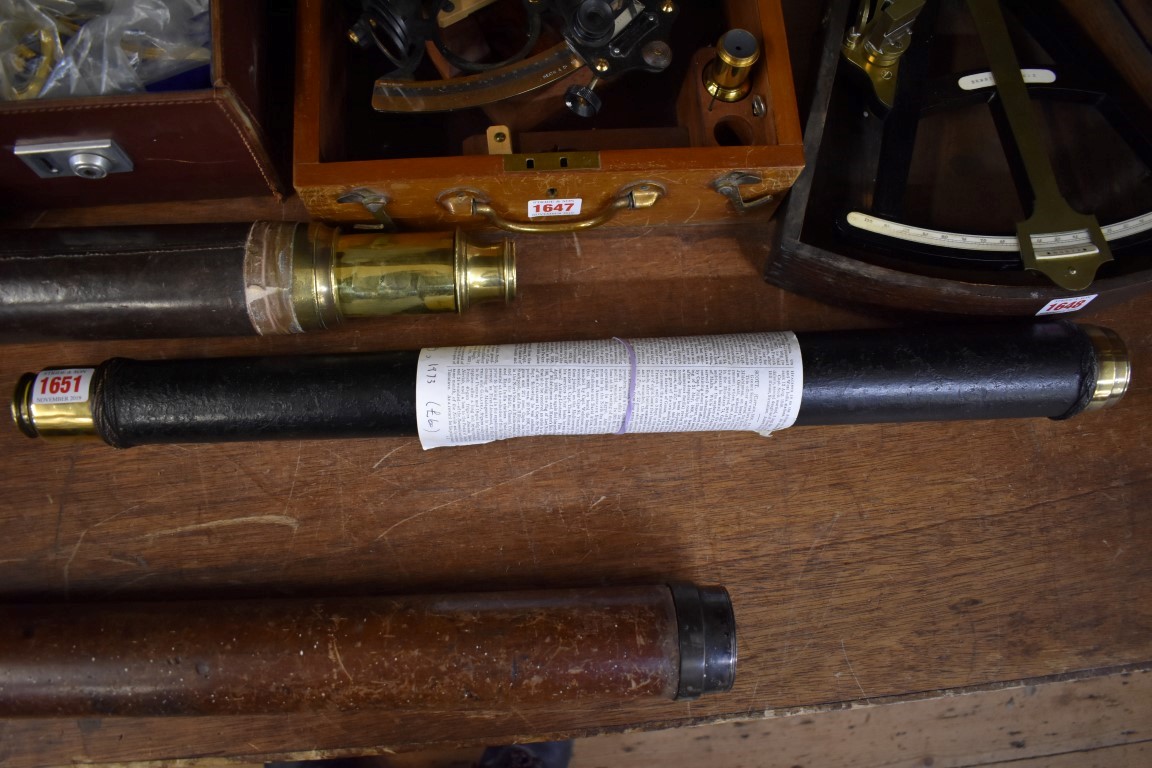 An antique brass and leather single drawer telescope, inscribed 'Commander E H Scott, H M Ship