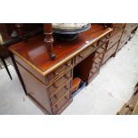 An antique mahogany pedestal desk, 104cm wide.