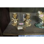 A pair of gilt brass dwarf candlesticks, 12cm high; together with another glass trinket box.