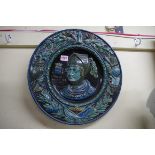 A Continental majolica 'Charles Martel' circular plaque, 40cm diameter.