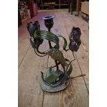An Austrian cold painted bronze figural candlestick, modelled with a crane, 25cm.