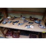 A collection of duck models, to include four by Val Bennett.