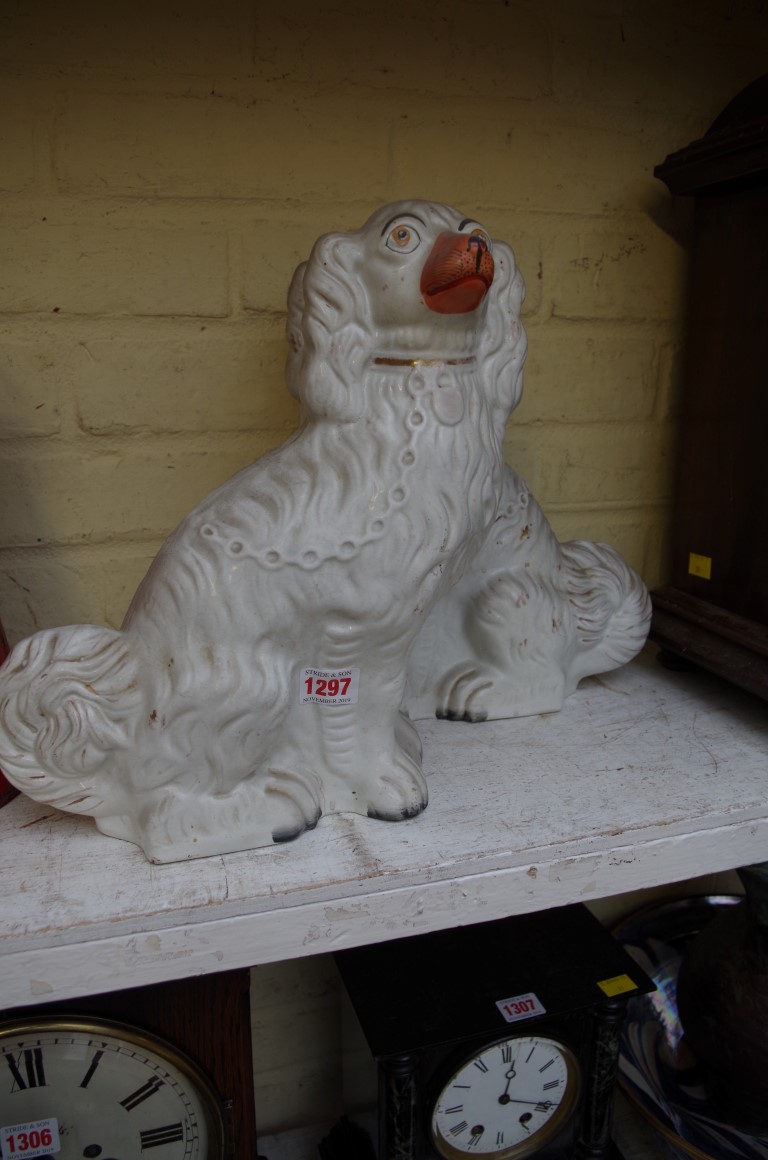 A pair of Victorian Staffordshire pottery dogs, 31cm high.