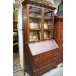 A George III  oak bureau bookcase, 113cm wide.