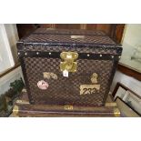 A vintage Louis Vuitton canvas and metal bound trunk, circa 1890, with houndstooth chequered