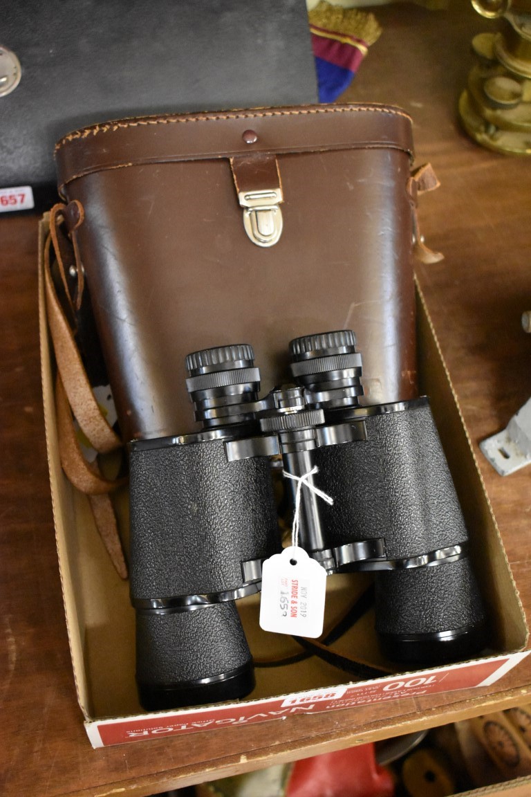 A pair of Dollond 10x50 binoculars, in leather case.