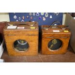 Two old oak cased pigeon clocks.