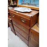 An oak chest of drawers, with brass countersunk handles, 62cm wide.