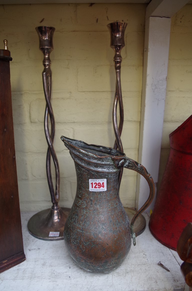 A Persian plated copper ewer, 25cm high; together with a pair of Ralph Lauren electroplated