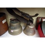 Two Swiss cow bells, one inscribed 'Albertan & Sohne, Luzern'.