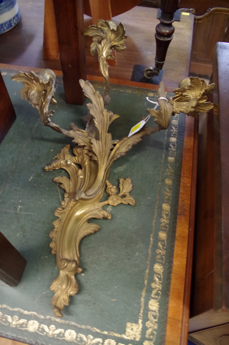 A pair of rococo style cast brass three branch wall lights, 51cm high. - Image 2 of 2