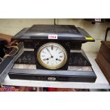 A slate and marble mantel clock, 40cm wide.