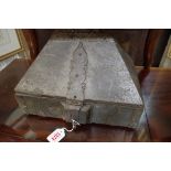 An antique stained wood and metal bound casket, 33cm wide.