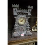 A novelty Continental castle form clock, 26cm high.