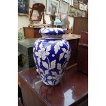 A pair of blue and white pottery table lamps, height excluding fitting 35cm.