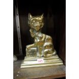 A Victorian brass 'Ye Cheshire Cat' doorstop, 25cm high.