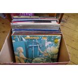 A interesting collection of 33rpm vinyl records, mostly rock and pop.