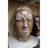 A terracotta bust of a South East Asian Bodhisattva, 35cm high.