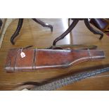 A vintage tan leather 'leg of mutton' gun case, 76.5cm long.