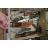 A collection of old pocket knives and similar.