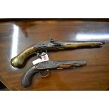 An 18th century British Long Sea Service flintlock pistol, dated 1759; together with an antique