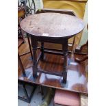 An antique oak occasional table, 49.5cm diameter.