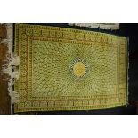 A small signed fine silk Persian Qum rug, 120 x 78cm.